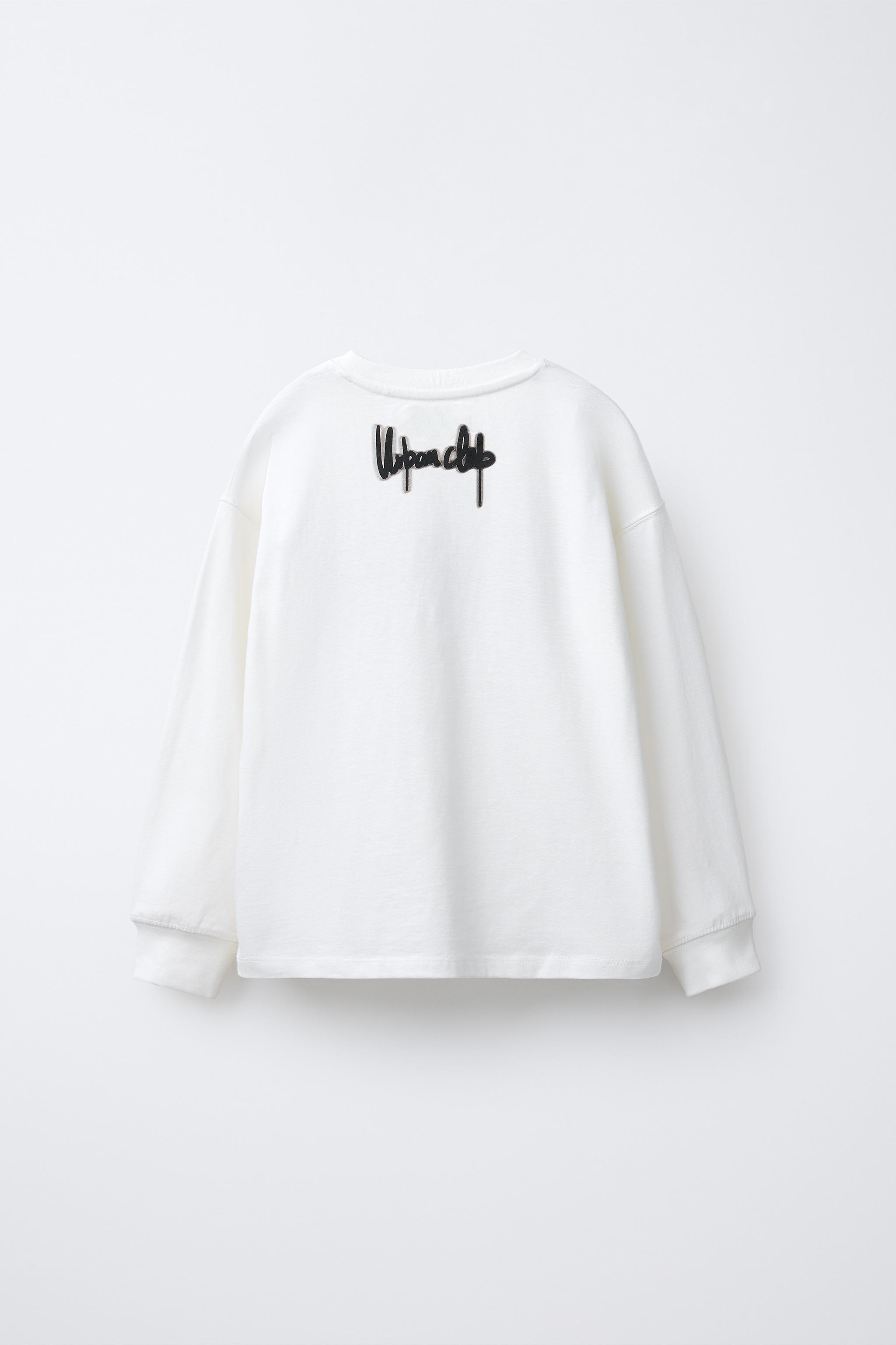 T-SHIRT À INSCRIPTION EN RELIEF